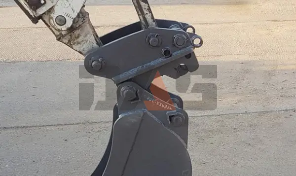 Быстросъемные устройства для экскаваторов-погрузчиков